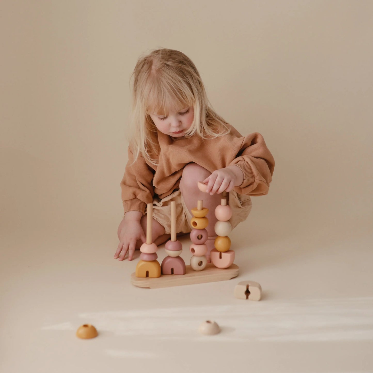 Wooden Multi Shape Stacker Educational Toy for Kids with 20 Shapes and Non Toxic Paint Mushie Everetts Place: Online Boutique