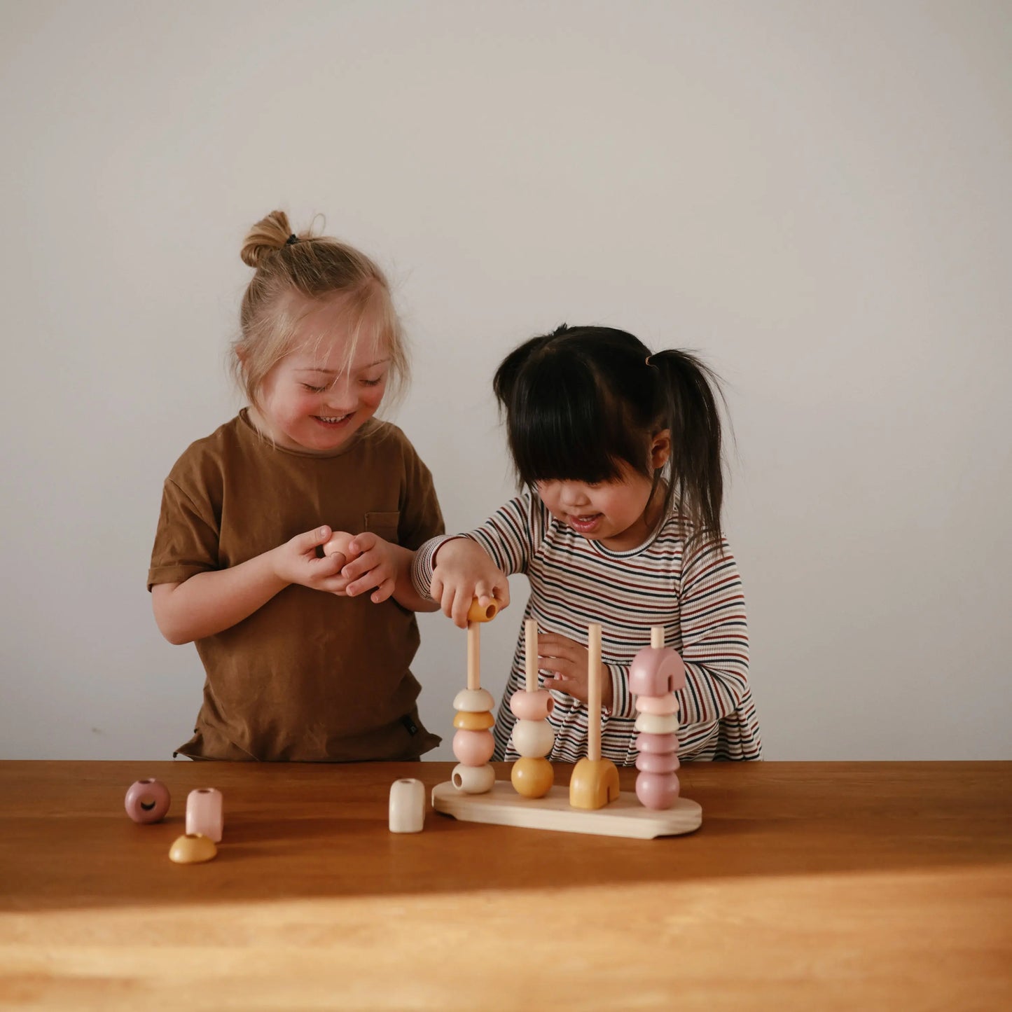 Wooden Multi Shape Stacker Educational Toy for Kids with 20 Shapes and Non Toxic Paint Mushie Everetts Place: Online Boutique