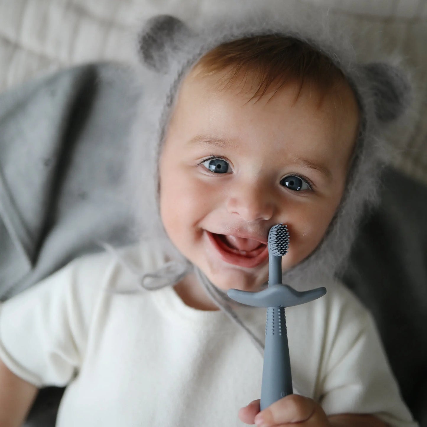 Star Training Toothbrush for Kids with Soft Silicone Bristles and Gentle Gum Care Mushie