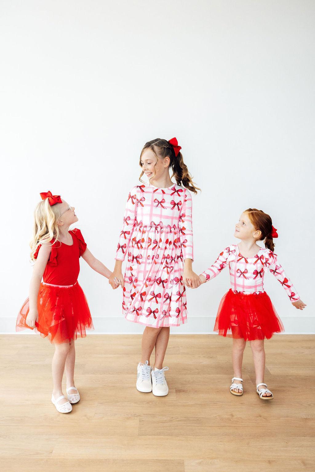 Mila & Rose ® Mila And Rose Bow La La Long Sleeve Flutter Sleeve Leotard - Apparel & Accessories > Clothing > Activewear > Dance Dresses, Skirts & Costumes Flutter Leotard L/S