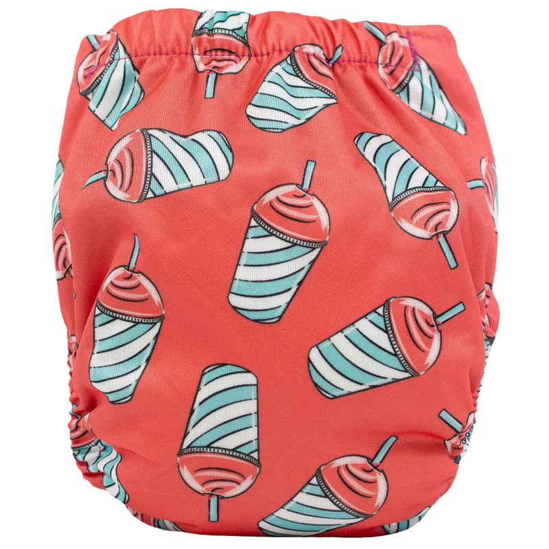 Tiny Tushies Newborn AIO cloth diaper with colorful drink print design.