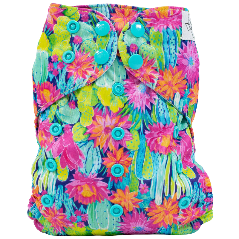 Slim Fit AIO Cloth Diaper with vibrant floral pattern and adjustable snaps.