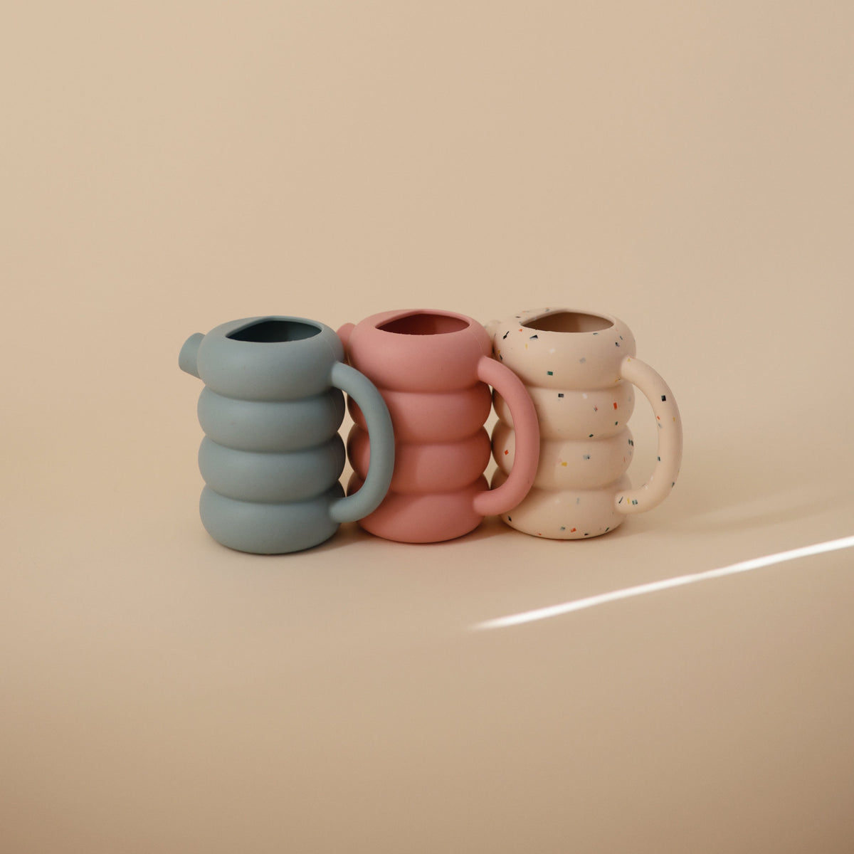 Silicone Watering Can by Mushie at Everetts Place