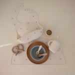 Mushie silicone placemat, non-toxic, non-slip for baby meals.