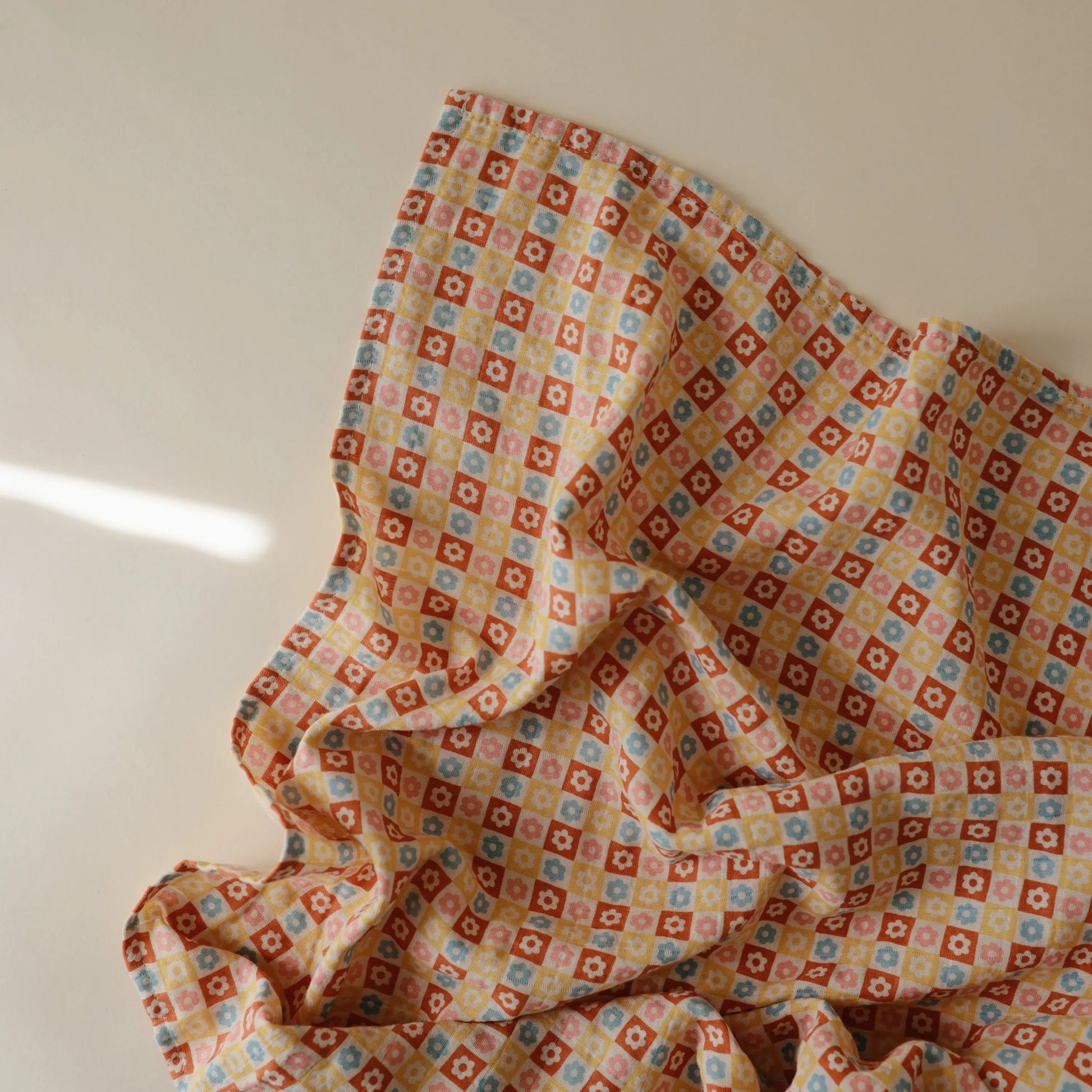 Organic Cotton Muslin Swaddle Blanket for Baby Cuddling and Nursing Mushie