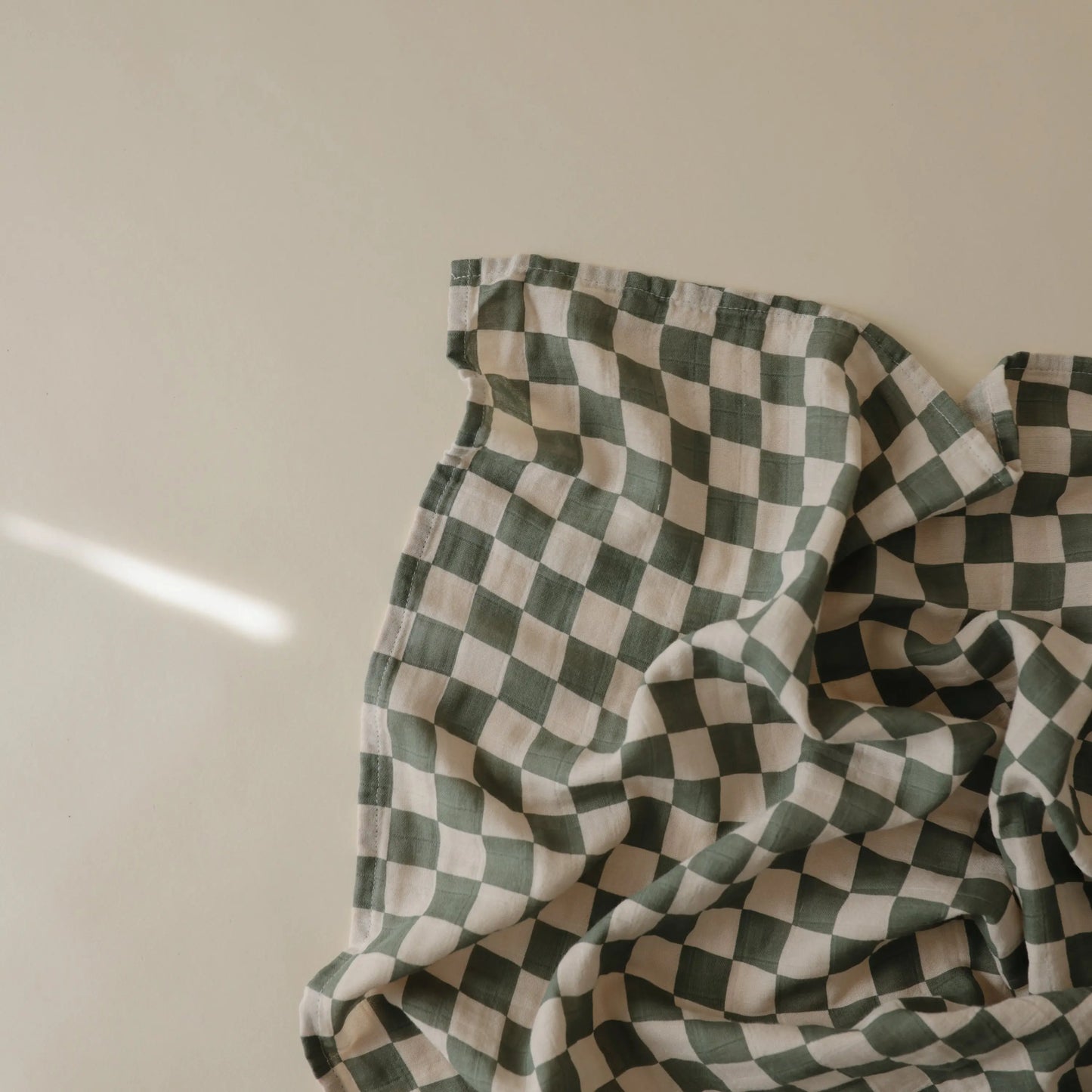 Organic Cotton Muslin Swaddle Blanket for Baby Cuddling and Nursing Mushie