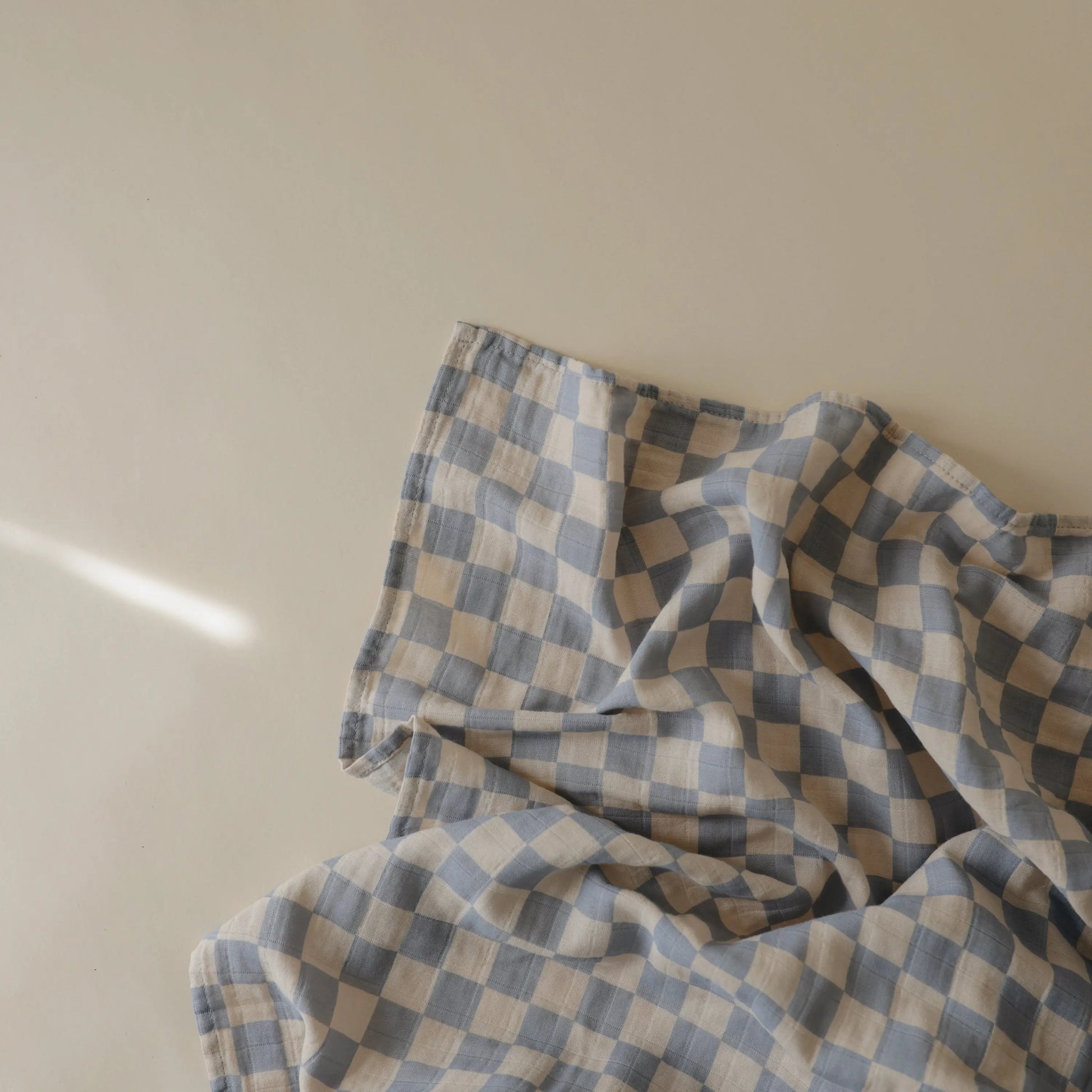 Organic Cotton Muslin Swaddle Blanket for Baby Cuddling and Nursing Mushie