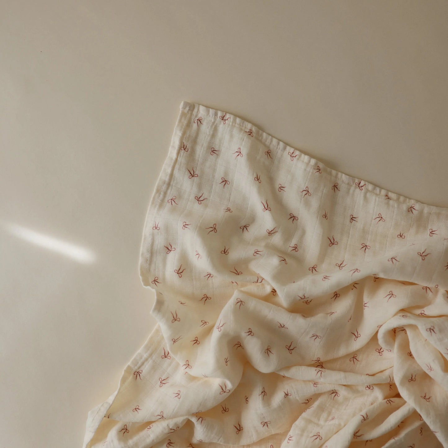 Organic Cotton Muslin Swaddle Blanket for Baby Cuddling and Nursing Mushie