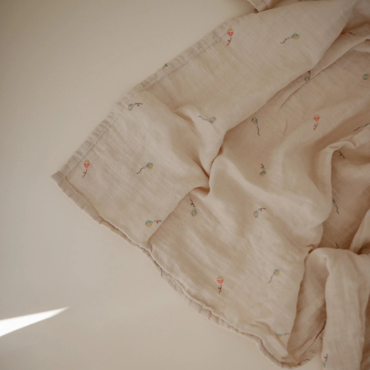 Organic Cotton Muslin Swaddle Blanket for Baby Cuddling and Nursing Mushie