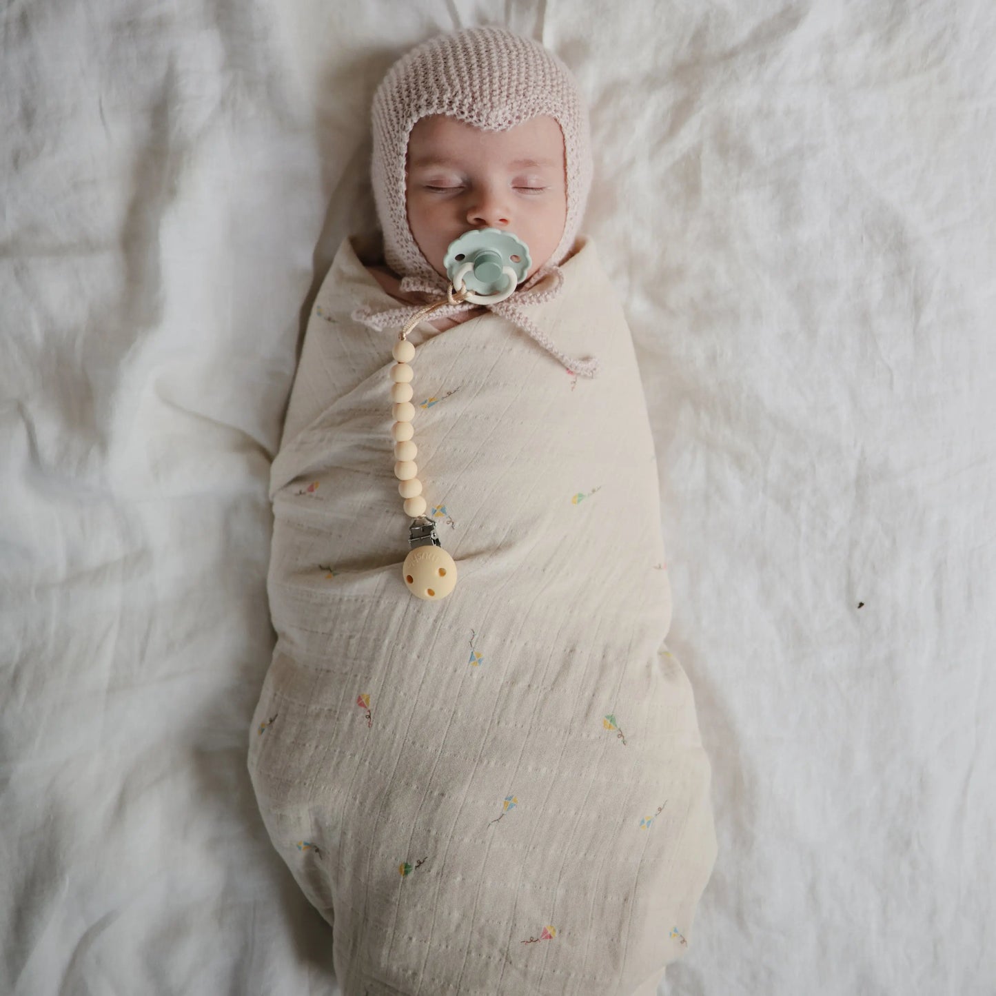 Organic Cotton Muslin Swaddle Blanket for Baby Cuddling and Nursing Mushie