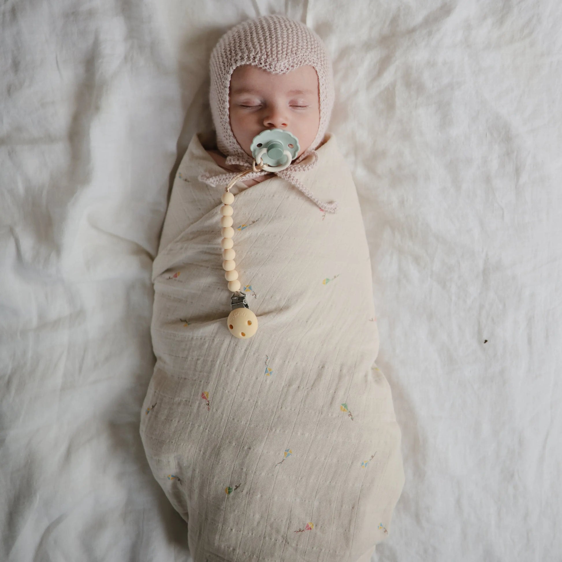Organic Cotton Muslin Swaddle Blanket for Baby Cuddling and Nursing Mushie