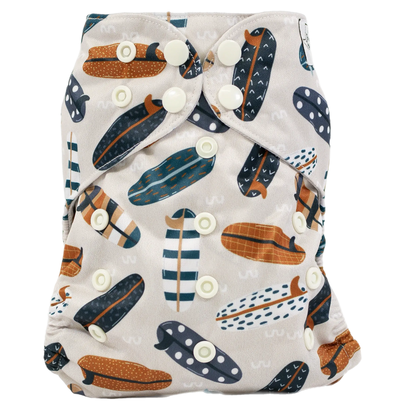 Slim Fit Pocket Cloth Diaper with surfboard print, adjustable snaps, and athletic wicking jersey material.
