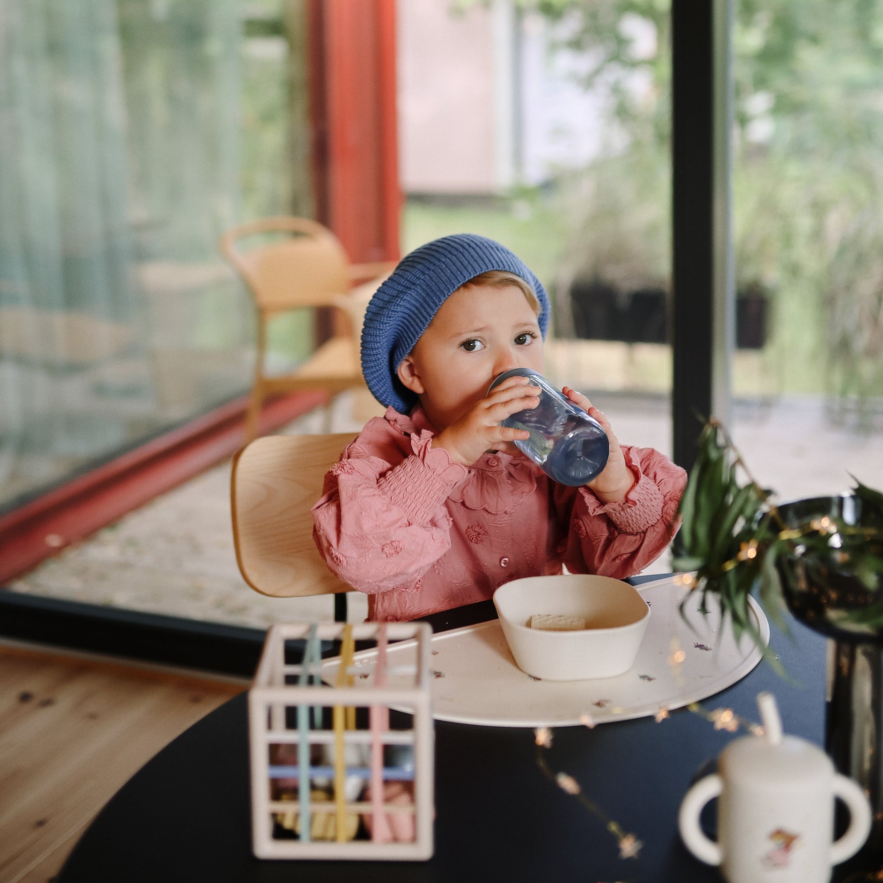 Mushie square silicone dinnerware bowls for baby and toddler feeding.