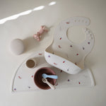 Mushie BPA-free silicone placemat, easy clean for baby.