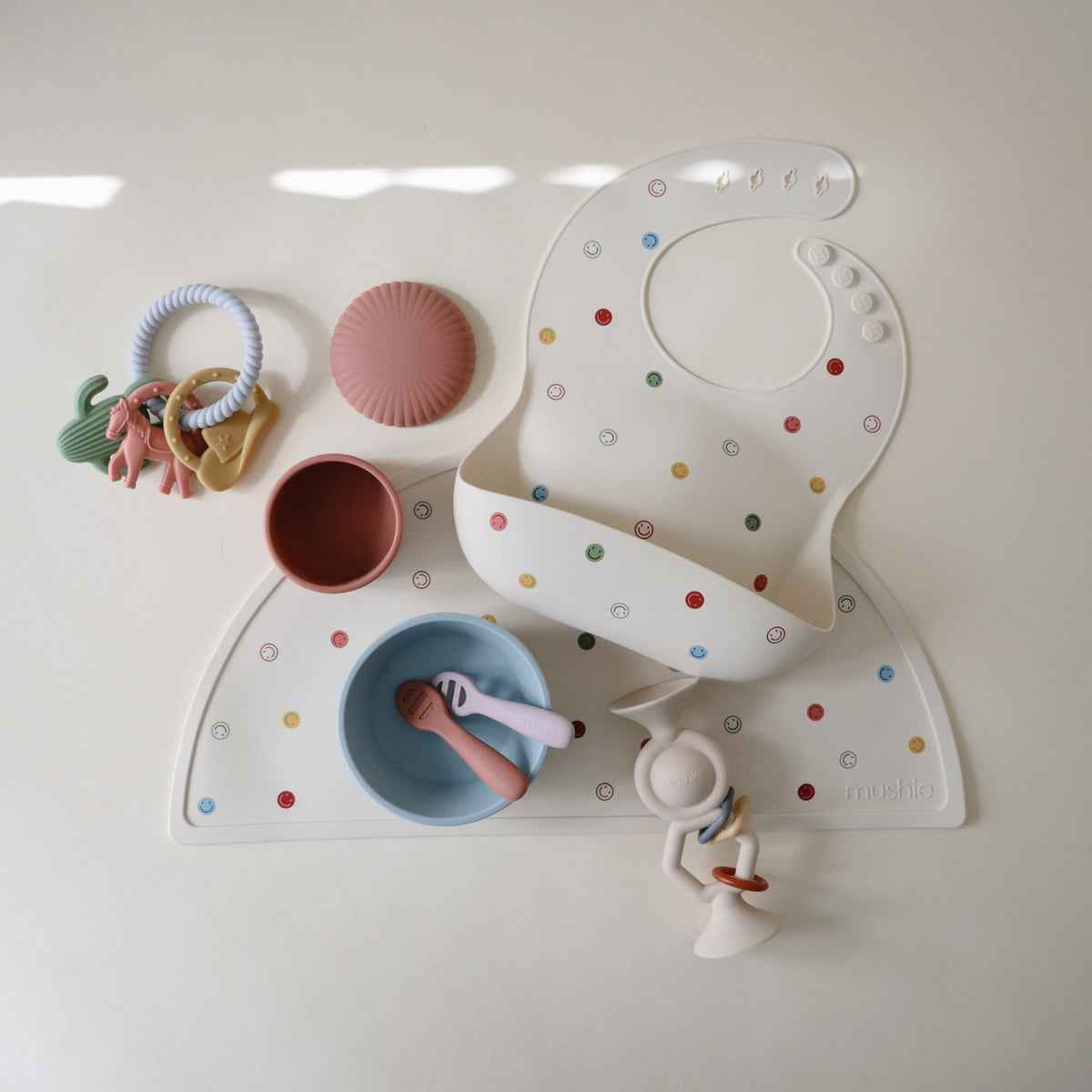Mushie non-slip food-grade silicone placemat for baby and toddler mealtime.