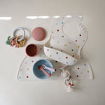 Mushie non-slip food-grade silicone placemat for baby and toddler mealtime.