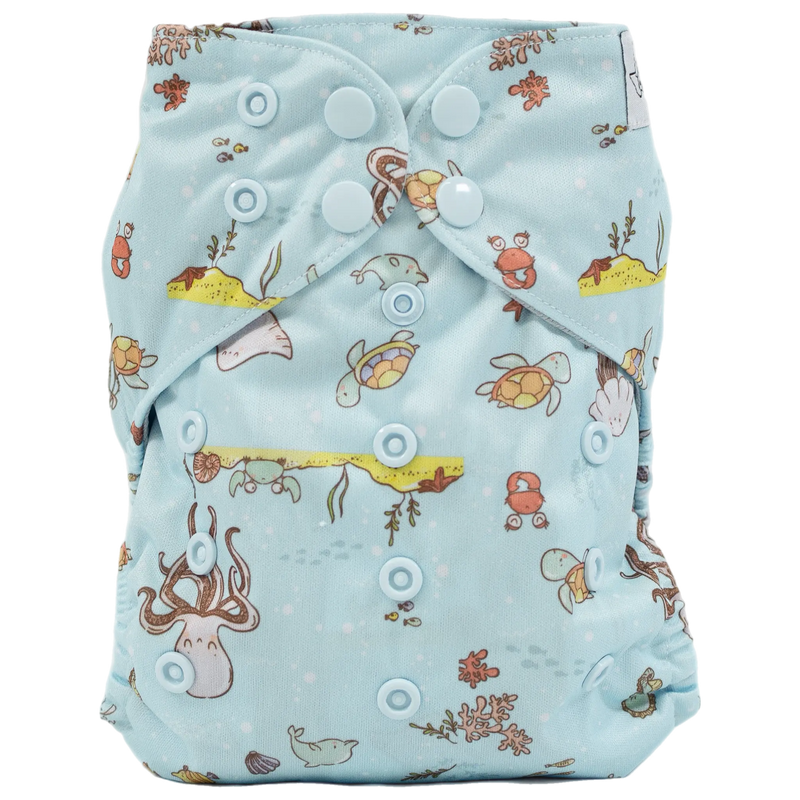 Slim Fit Pocket Cloth Diaper with colorful turtle and animal print, designed for babies 8-40 lbs.