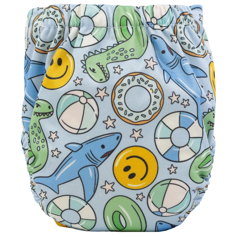 Tiny Tushies Newborn AIO Cloth Diaper with playful aquatic and celestial design.