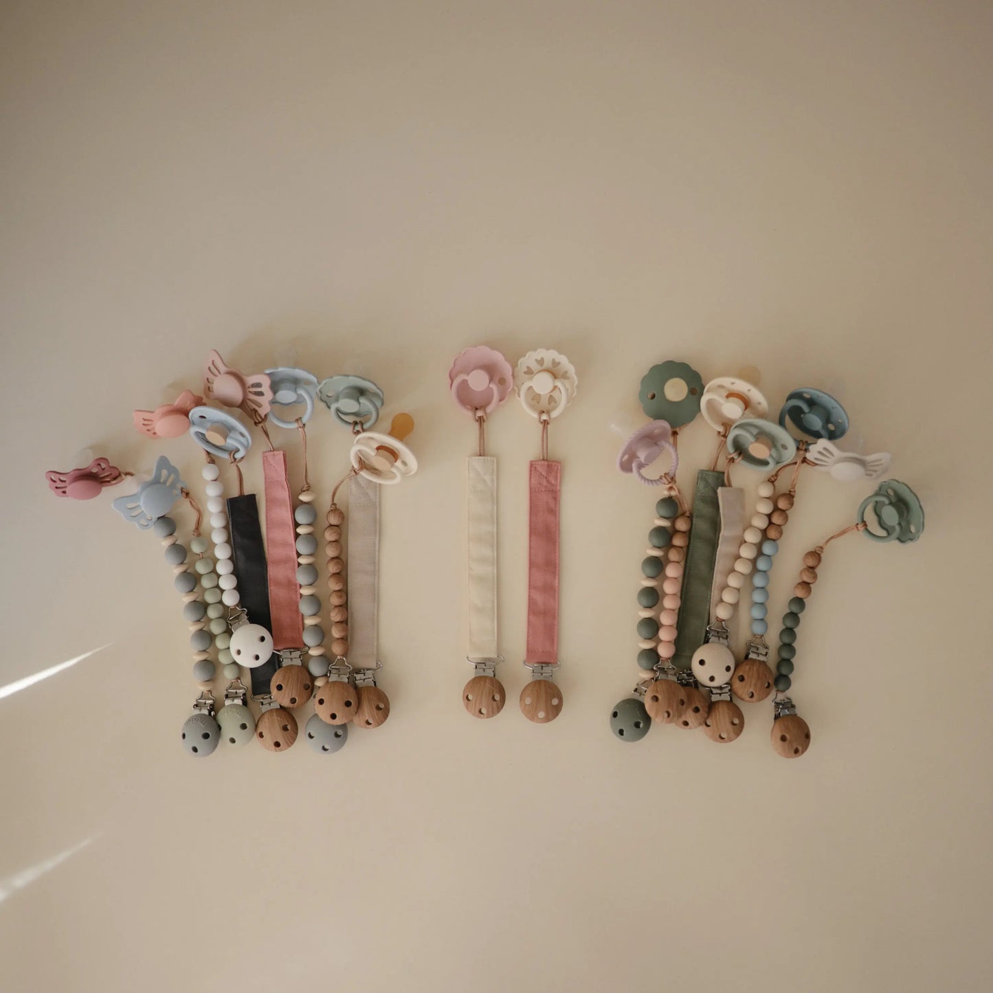 Linen Pacifier Clip Two Pack with Water Resistant Coating and Faux Wood Silicone Clasp Mushie