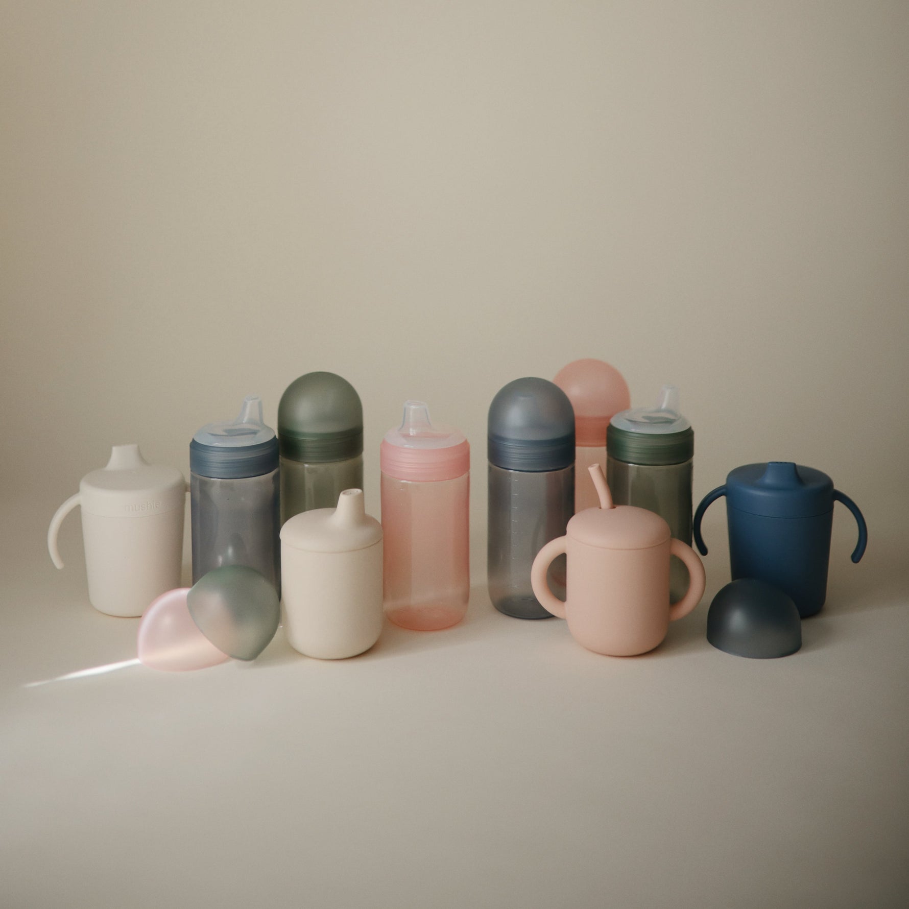 Mushie Soft Spout Sippy Cup for baby's gentle sips, easy grip.
