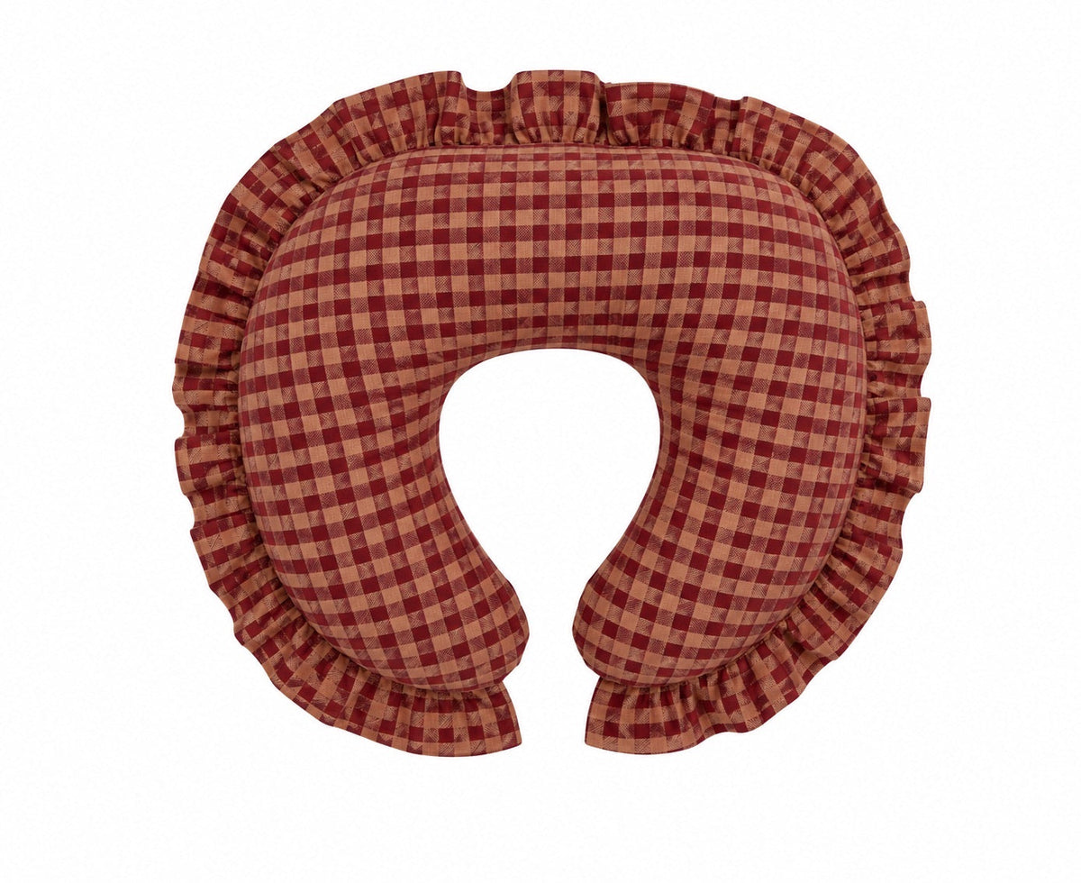 Nursing pillow cover in red and beige gingham with a ruffle trim