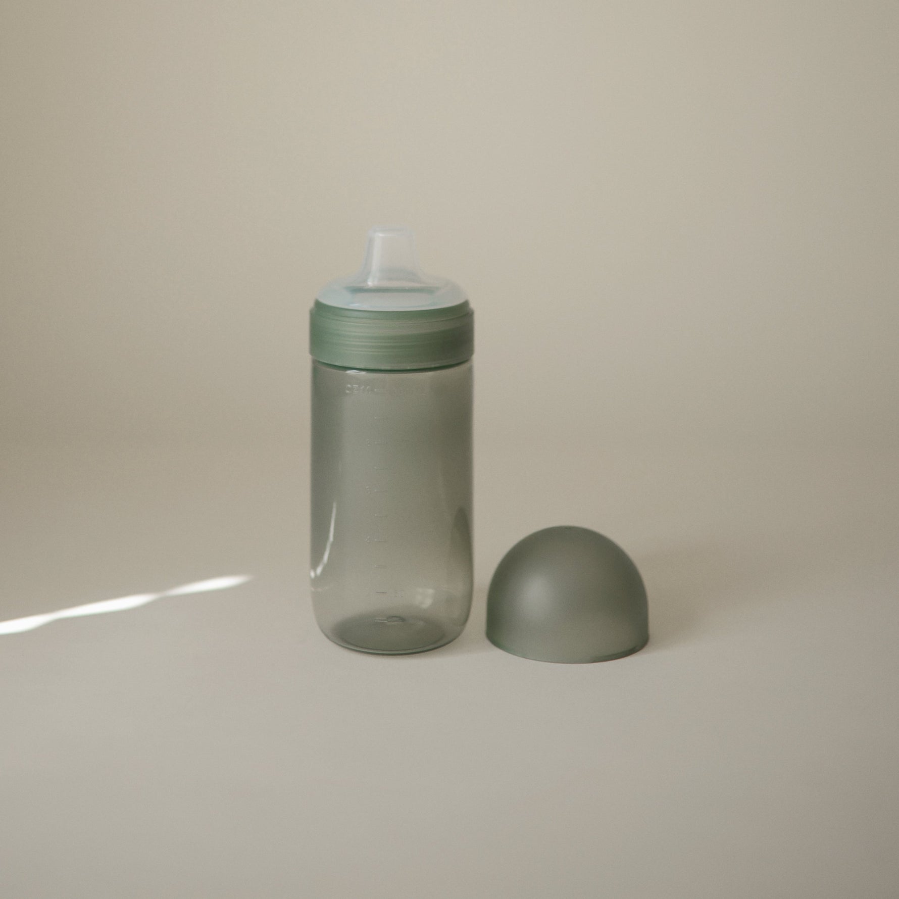 Mushie Soft Spout Sippy Cup, gentle for baby's first drinks.