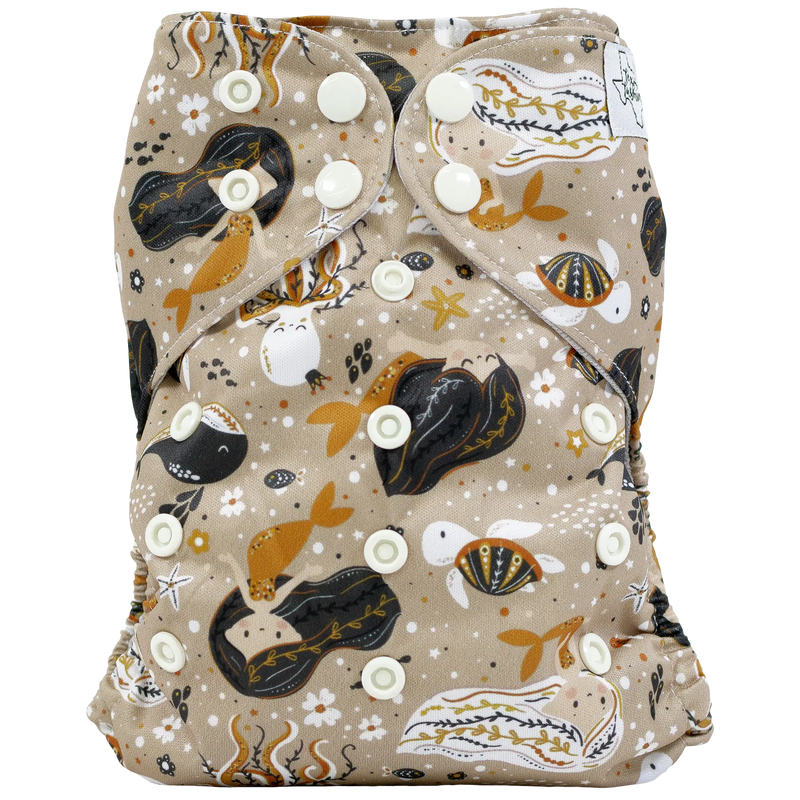 Slim fit pocket cloth diaper with marine-themed pattern and adjustable snaps.