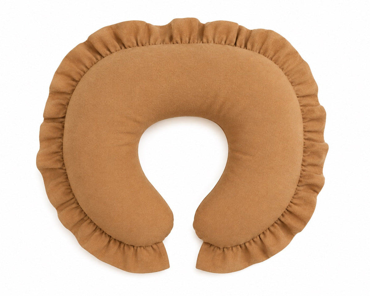Solid brown nursing pillow cover with ruffle trim, shaped to fit a standard curved nursing pillow