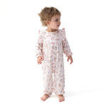 Viscose bamboo ruffle snap romper with a cowgirl boots and bows print