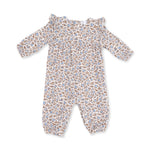 Baby romper in Hazel floral print with ruffle sleeves and snap closures at the legs