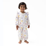 Baby romper with Spa Dogs print of pampered pups, ruffle sleeves, and snap closures along the bottom