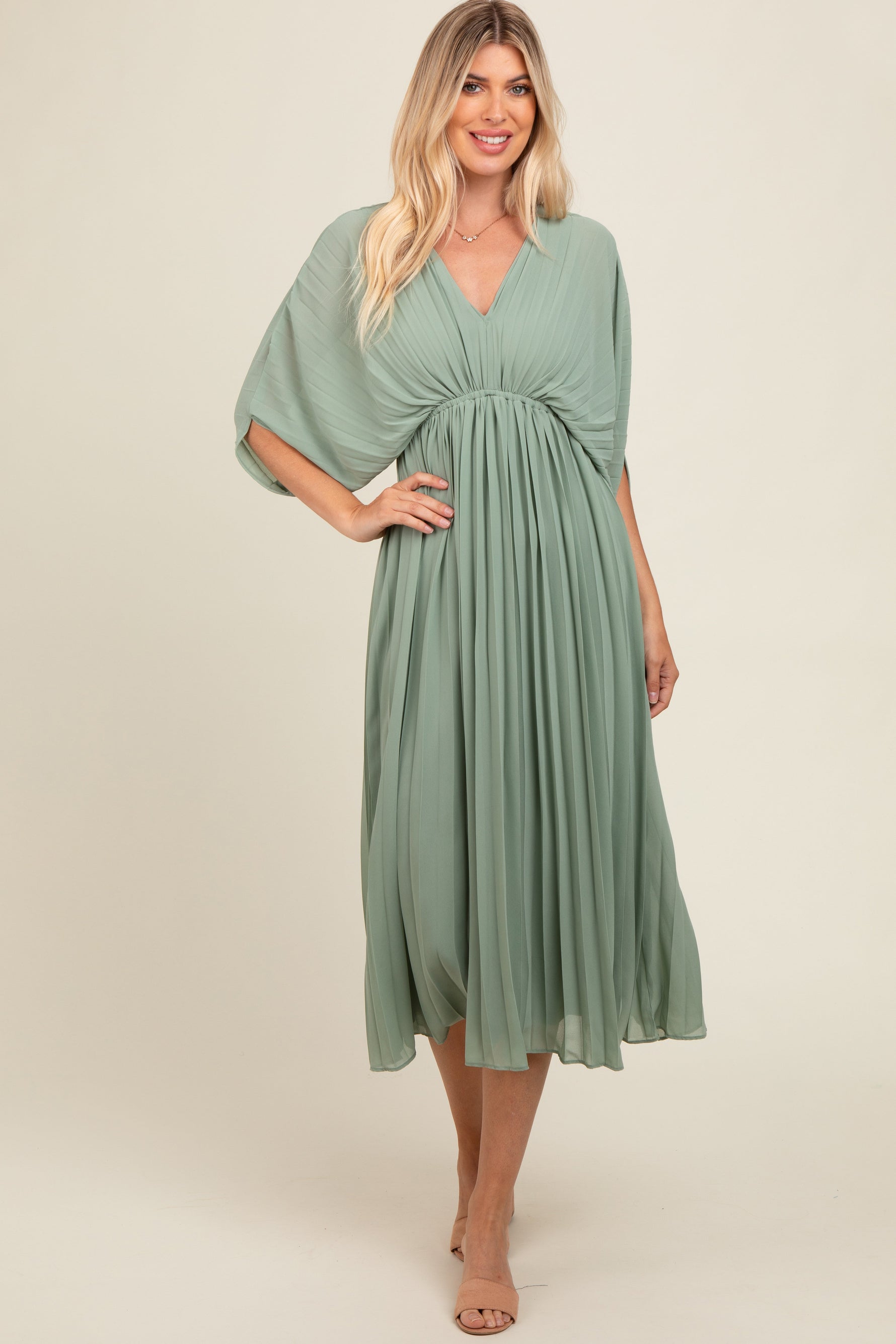Light olive pleated V-neck maxi dress with a gathered waist and loose kimono-style sleeves