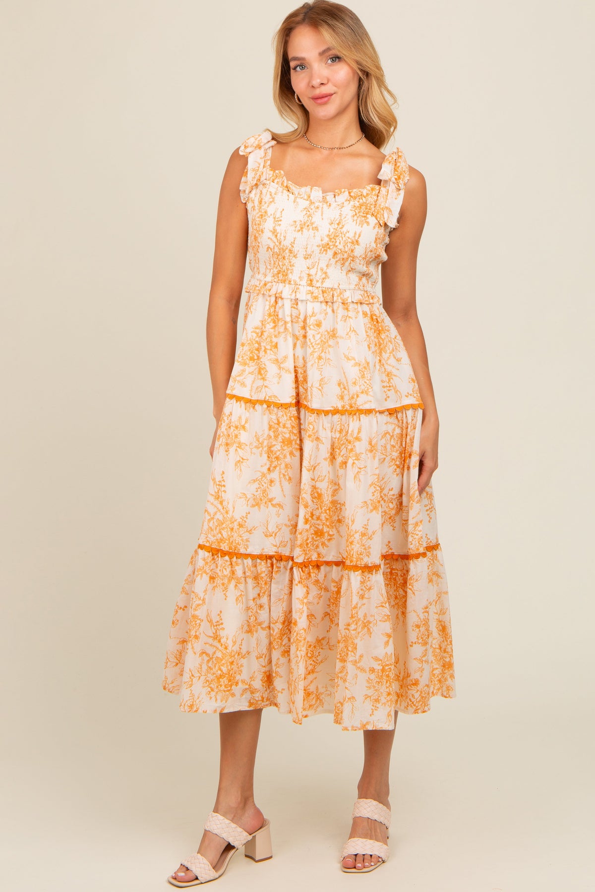 PinkBlush peach floral sleeveless ruffle tiered maternity midi dress.