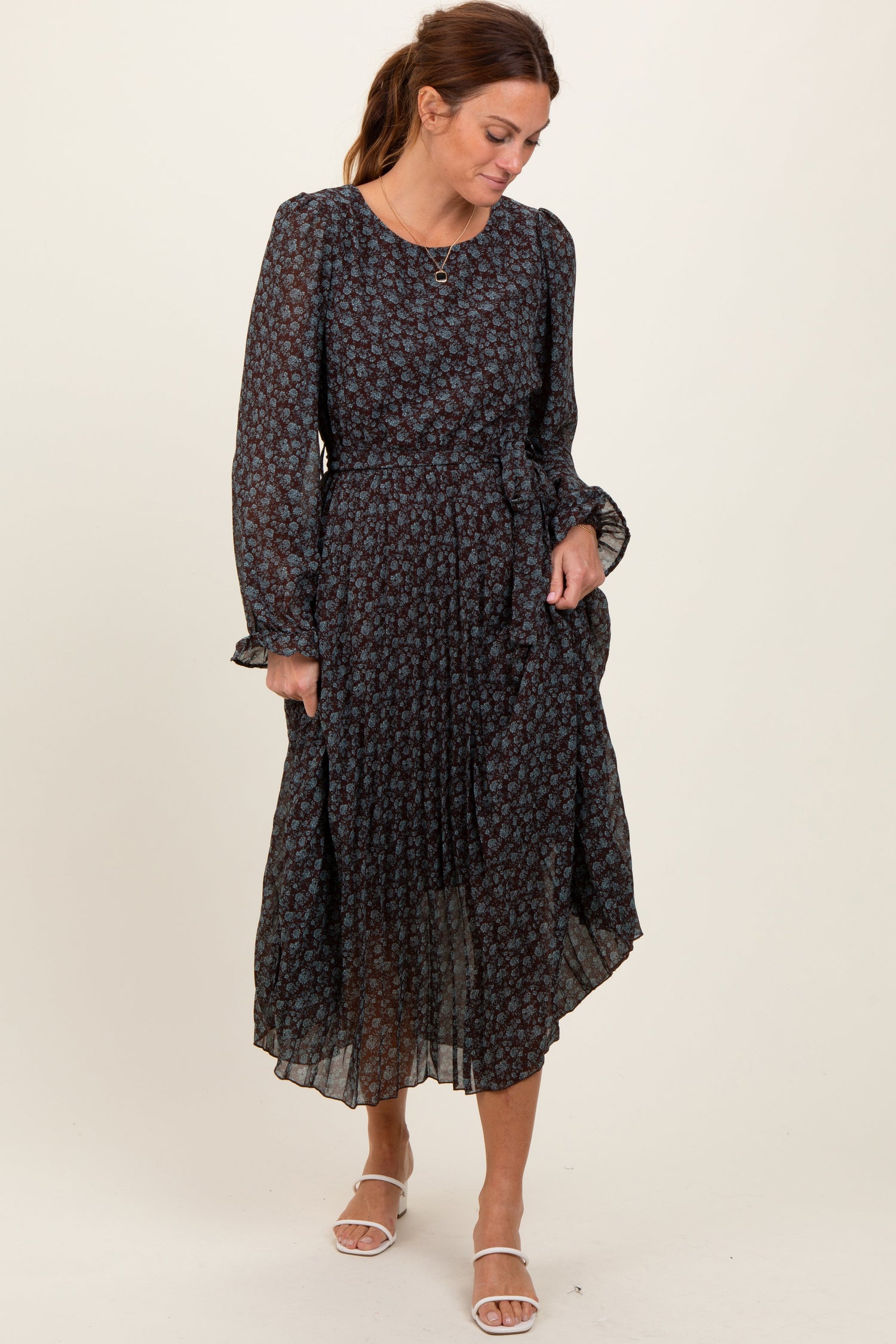 Pleated floral midi dress with long ruffle-cuff sleeves and a front tie waist