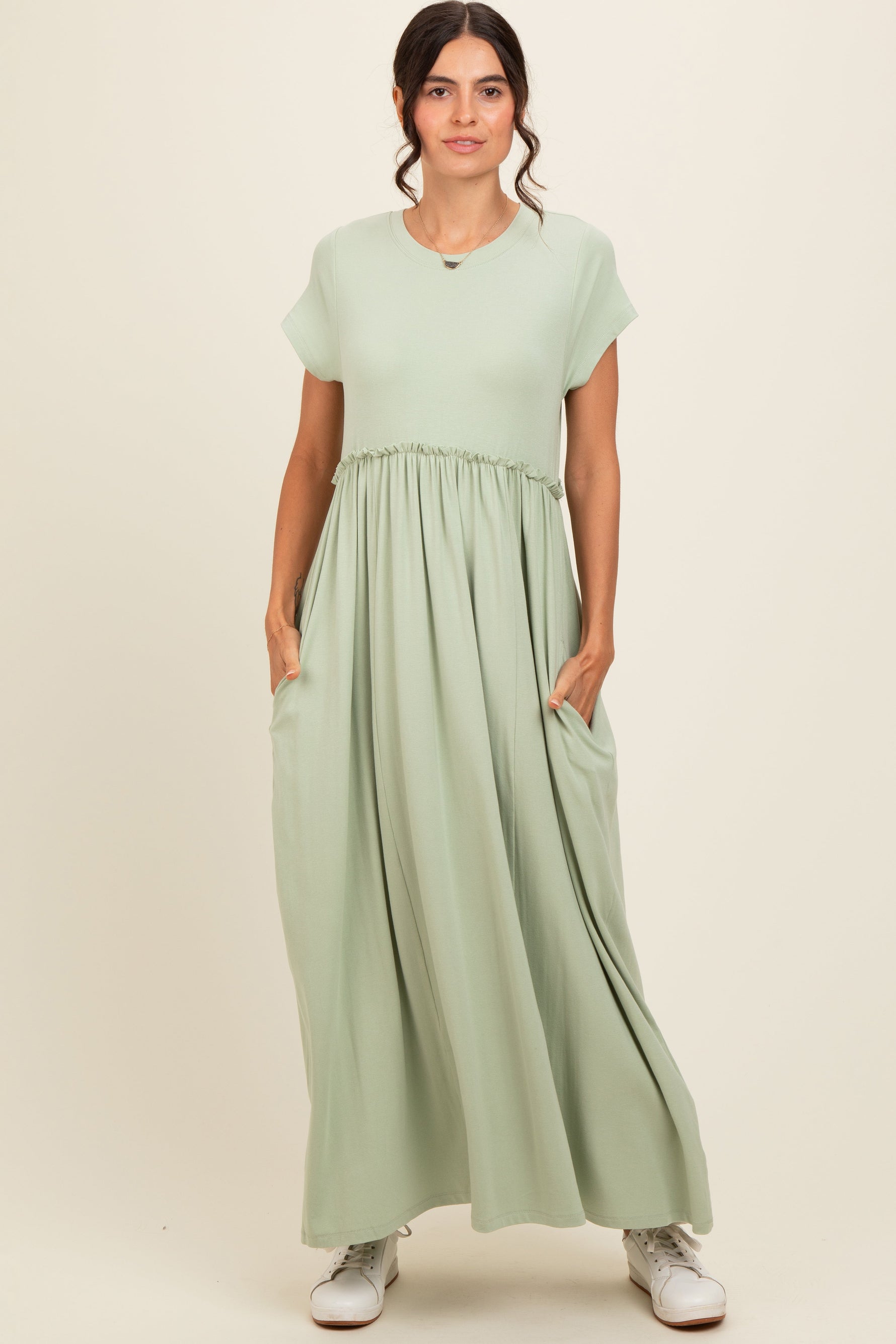 Light olive ruffle trim maxi dress with short sleeves, round neckline, and gathered waist.