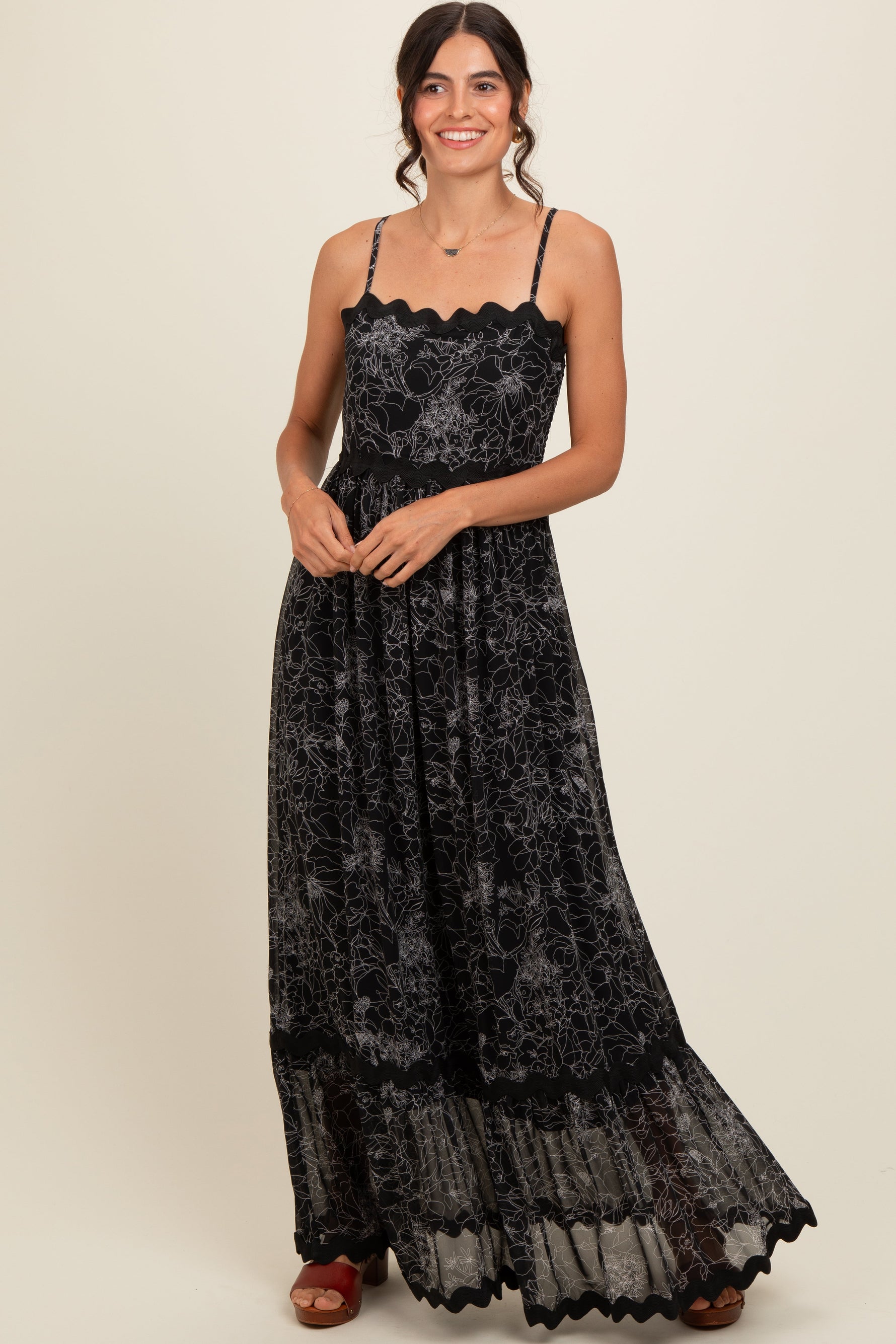 PinkBlush Black Floral Contrast Trim Maternity Maxi Dress worn by a pregnant model.