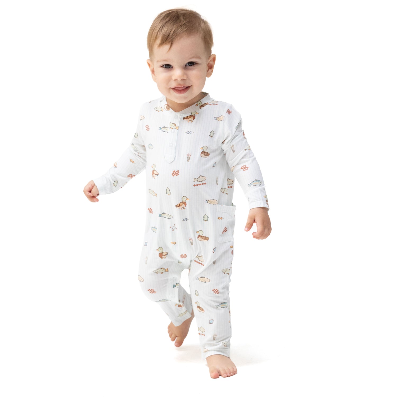 Baby romper with Henley neckline and snap closures, made with viscose from bamboo