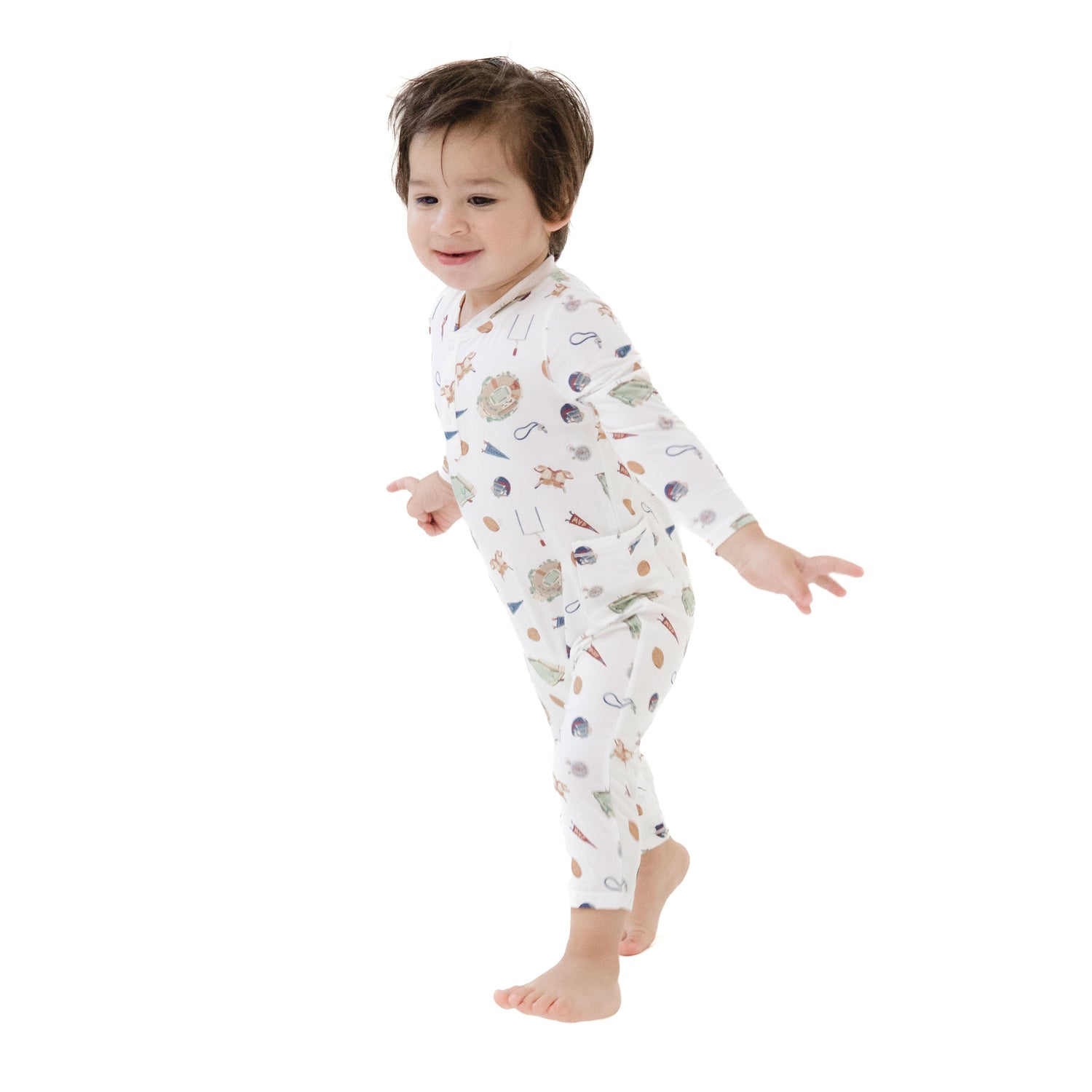 Baby romper in a muted vintage football print with a Henley neckline and snap closures