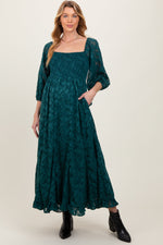 Forest Green Textured Overlay Smocked Ruffled Hem Maternity Maxi Dress by PinkBlush