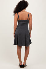 Charcoal ribbed knit sleeveless mini dress with adjustable straps.