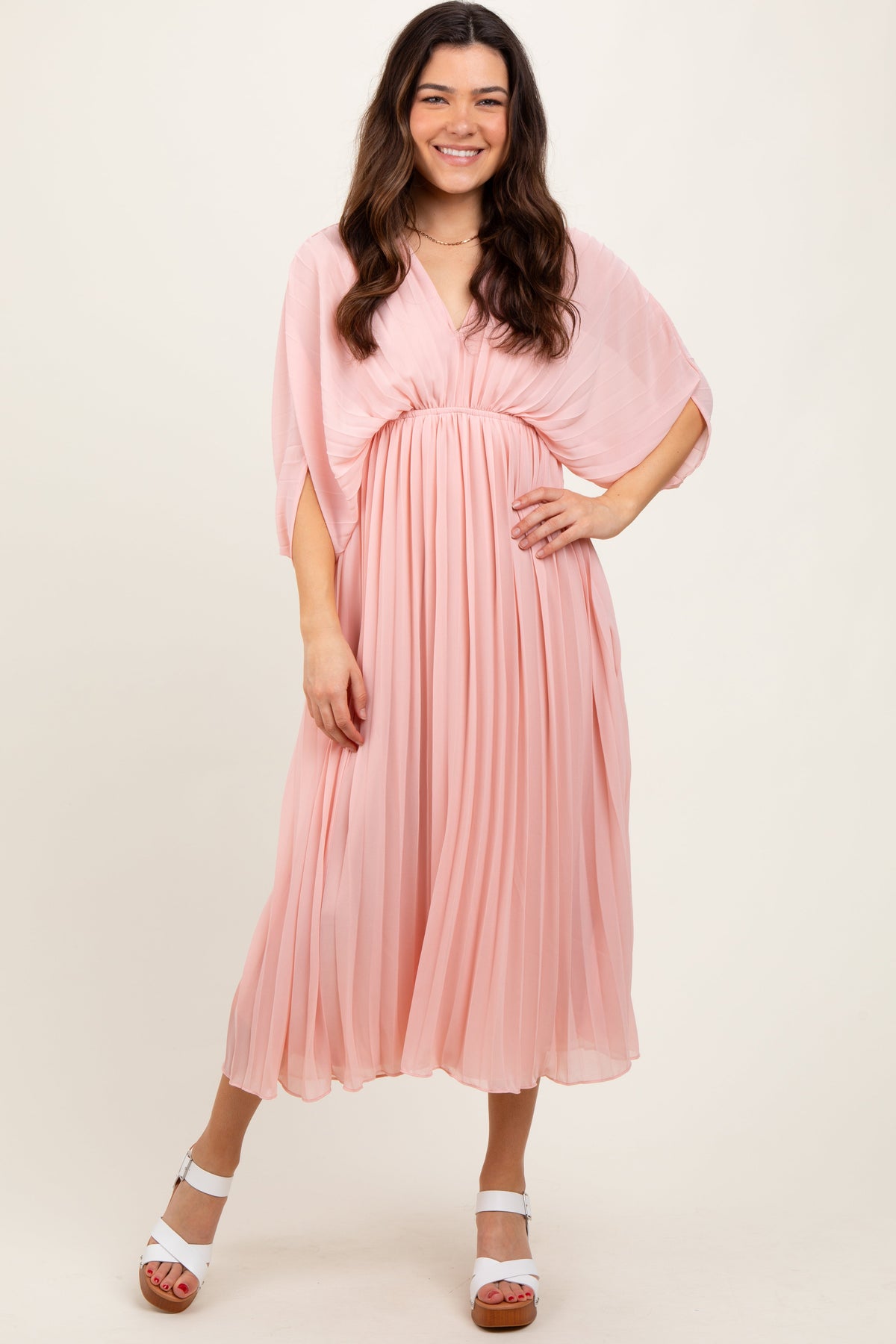 Model wearing a Light Pink Pleated V-Neck Maxi Dress by PinkBlush, flowing fabric, elegant and comfortable.