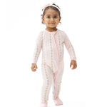 Convertible romper in a soft striped Antoinette print with a two-way zipper and covered footies.