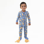 Convertible baby romper with glow-in-the-dark dinosaur dig print, two-way zipper, and foot cuffs