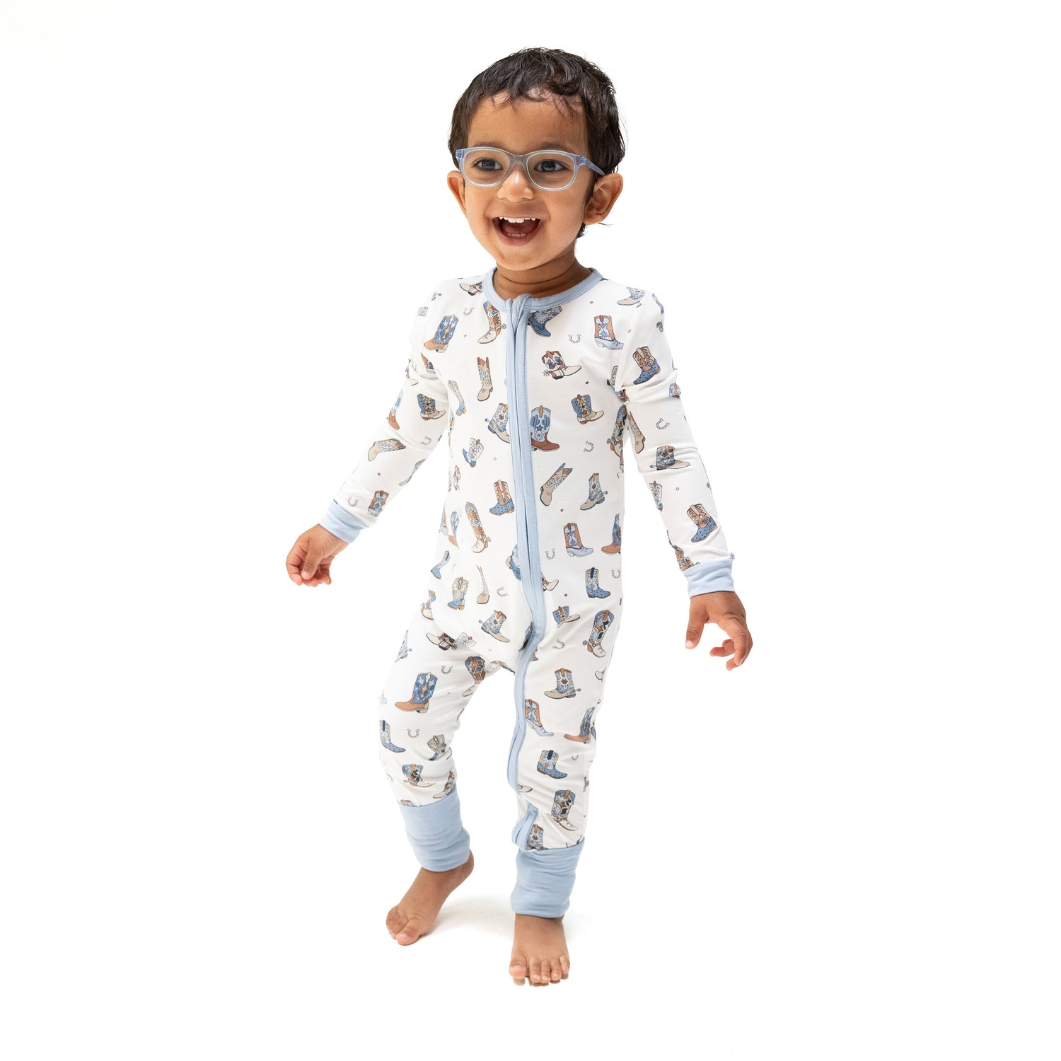 Bamboo convertible romper with front zipper, fold-over cuffs, and foot grippers in a buckaroo boots print