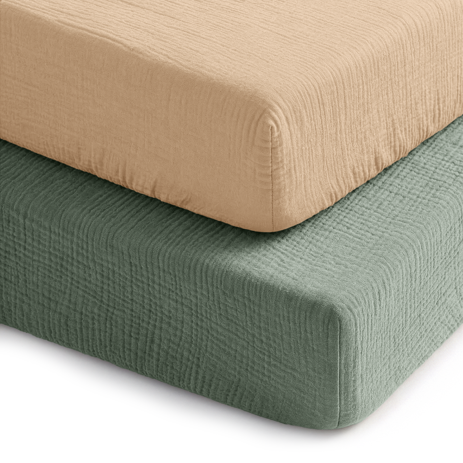 Two muslin fitted crib sheets in fern green and cream