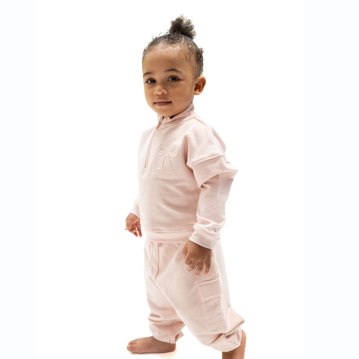 Veiled pink cargo pants with functional pockets and pull-on waist