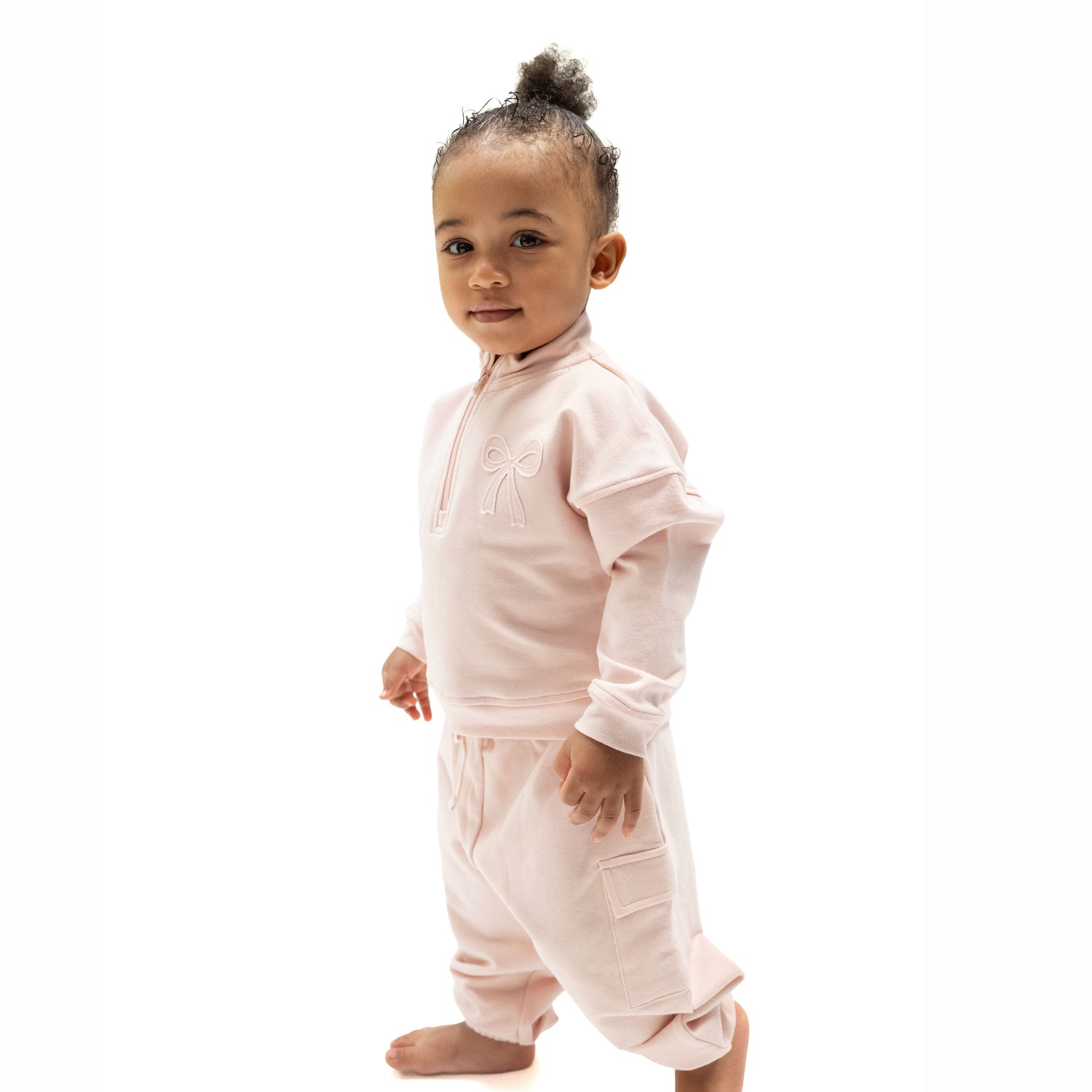 Veiled pink cargo pants with functional pockets and pull-on waist