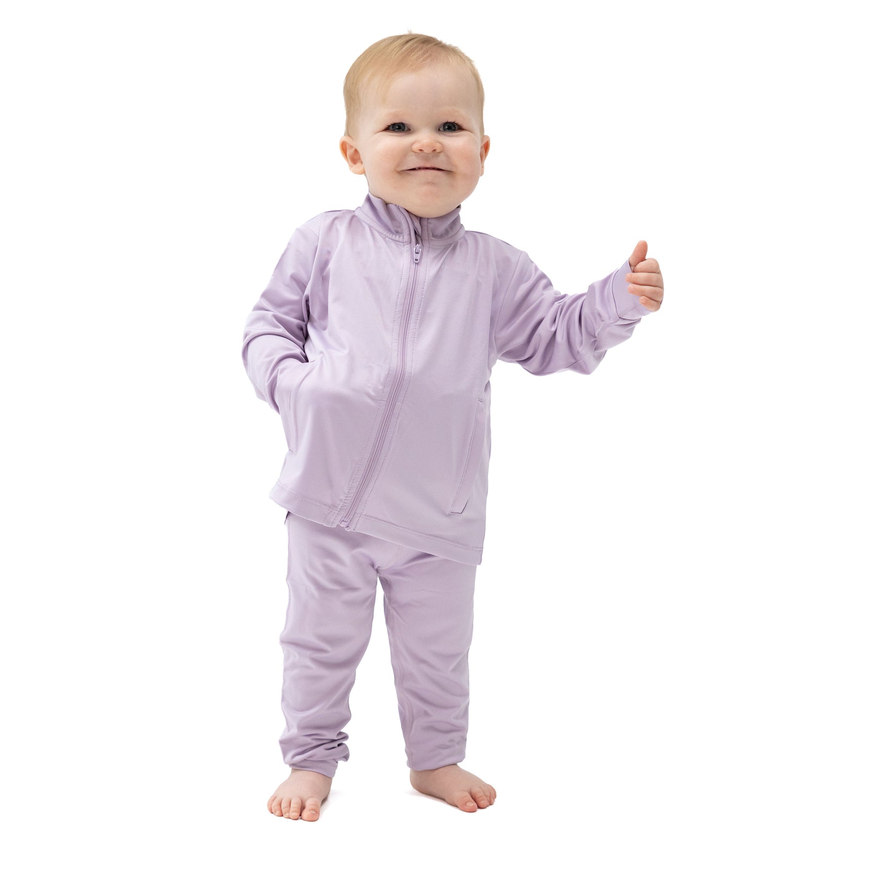 Lilac baby active jacket with mock neck collar, two front pockets and ruffle trim across the back