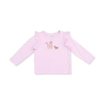 Long sleeve baby tee with ruffle shoulder detail and gingerbread girl and dog puff screenprint