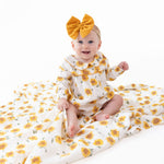 Baby swaddle blanket with sunflower design